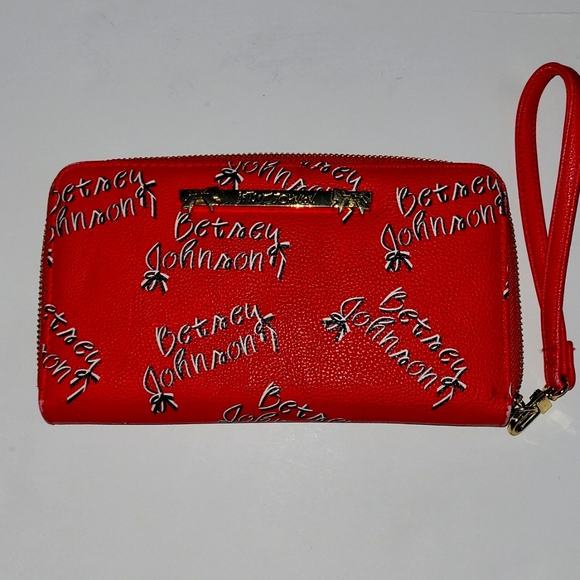 Betsey Johnson Handbags - 🛑EUC Betsey Johnson wallet  Large Betsey Johnson logo zip around large wallet !
